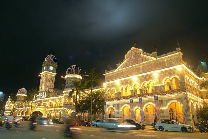 Best of KL at Night – Iconic Sights, Local Life & City Lights - Petaling Street Night Market: food smells, bargain tables, and quick street time