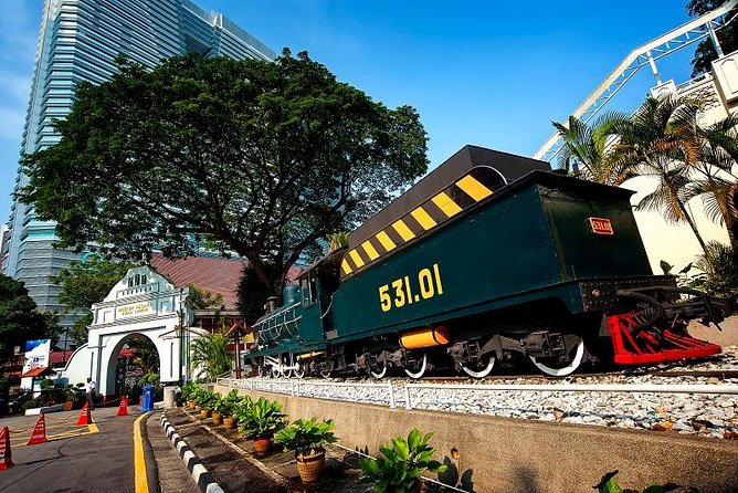 Best of Kuala Lumpur City Tour Including National Museum and National Monument - Kuala Lumpur Craft Complex and Cocoa stops: browsing Malaysian-made goods