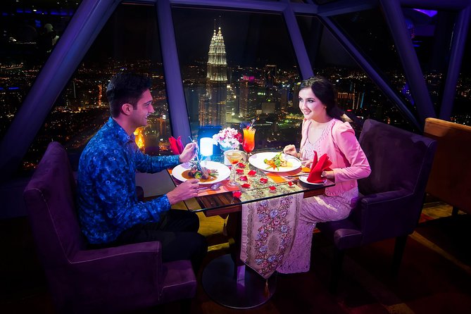 Dining at ORBIT Revolving Restaurant KL Tower with Transfers - The revolving view: night lights, window seats, and the pace of the spin