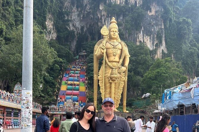 Exclusive Half Day Batu Caves and Private City Tour Kuala Lumpur - Batu Caves: 272 steps, Lord Karthikeyan, and real cave shrines