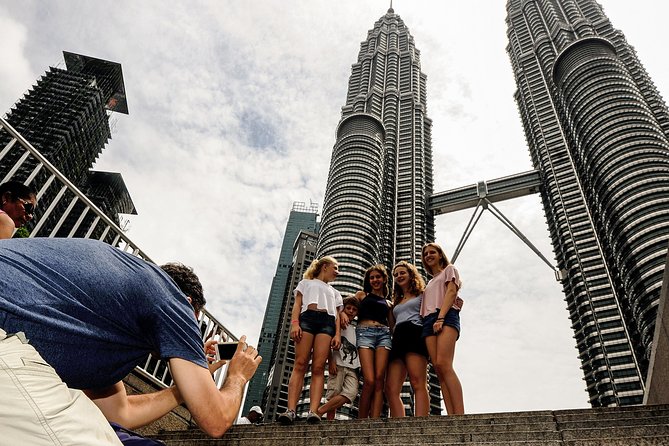 Group Tour: Half-Day Kuala Lumpur City Exploration Tour - Stop 1: Petronas Twin Towers for Skyline Photos and a Quick Reality Check