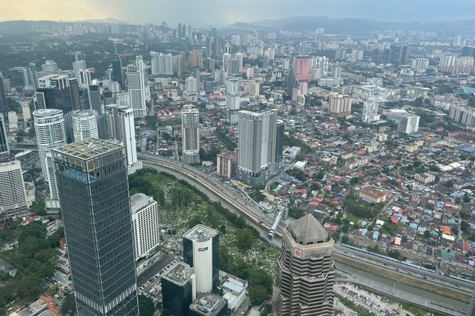Kuala Lumpur City Tour with Petronas Twin Tower Admission Ticket - River of Life, Old Rail Buildings, and Exchange 106 Views