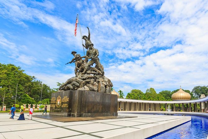 Kuala Lumpur Half-day City Tour - National Mosque (Masjid Negara): star-shaped drama and a skyline silhouette