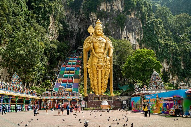 Private FullDay Tour includes Petronas Twin Towers & Batu Caves - Batu Caves first: temple caves, statues, and the climb factor